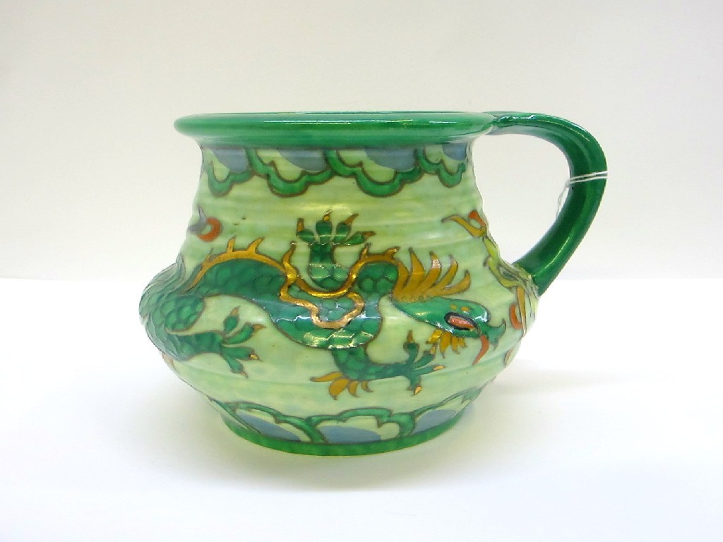 Appraisal: Charlotte Rhead Crown Ducal dragon decorated vase with handle signed