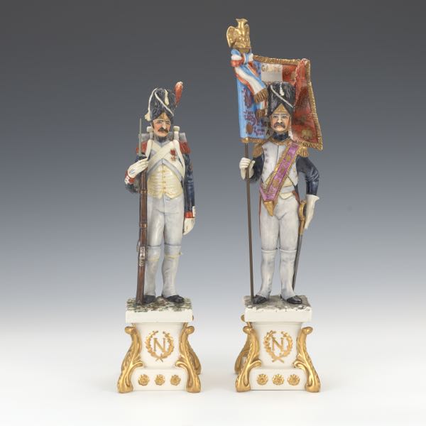 Appraisal: PAIR OF GUIDO CACCIAPUOTI NAPOLEONIC GUARDS Two porcelain figurines depicting