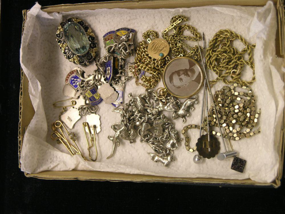 Appraisal: A Sterling silver bracelet with numerous enamelled silver pendants a