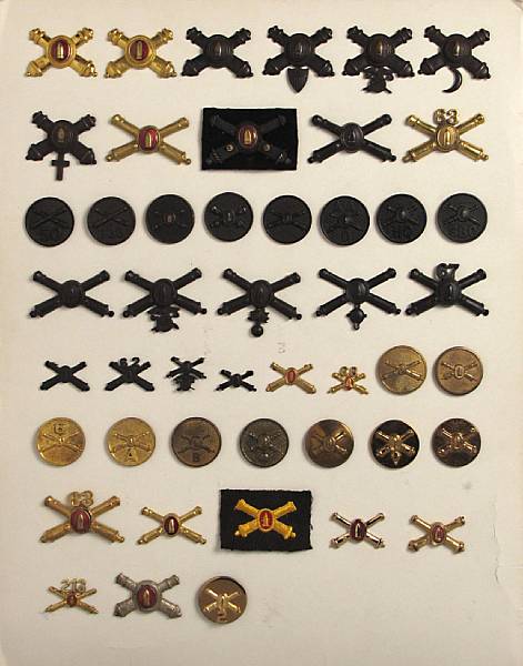 Appraisal: A group of Coast Artillery insignia and after Including examples