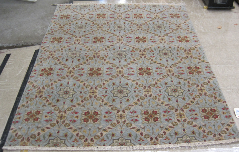 Appraisal: HAND KNOTTED ORIENTAL AREA RUG Indo-Persian overall floral panel design