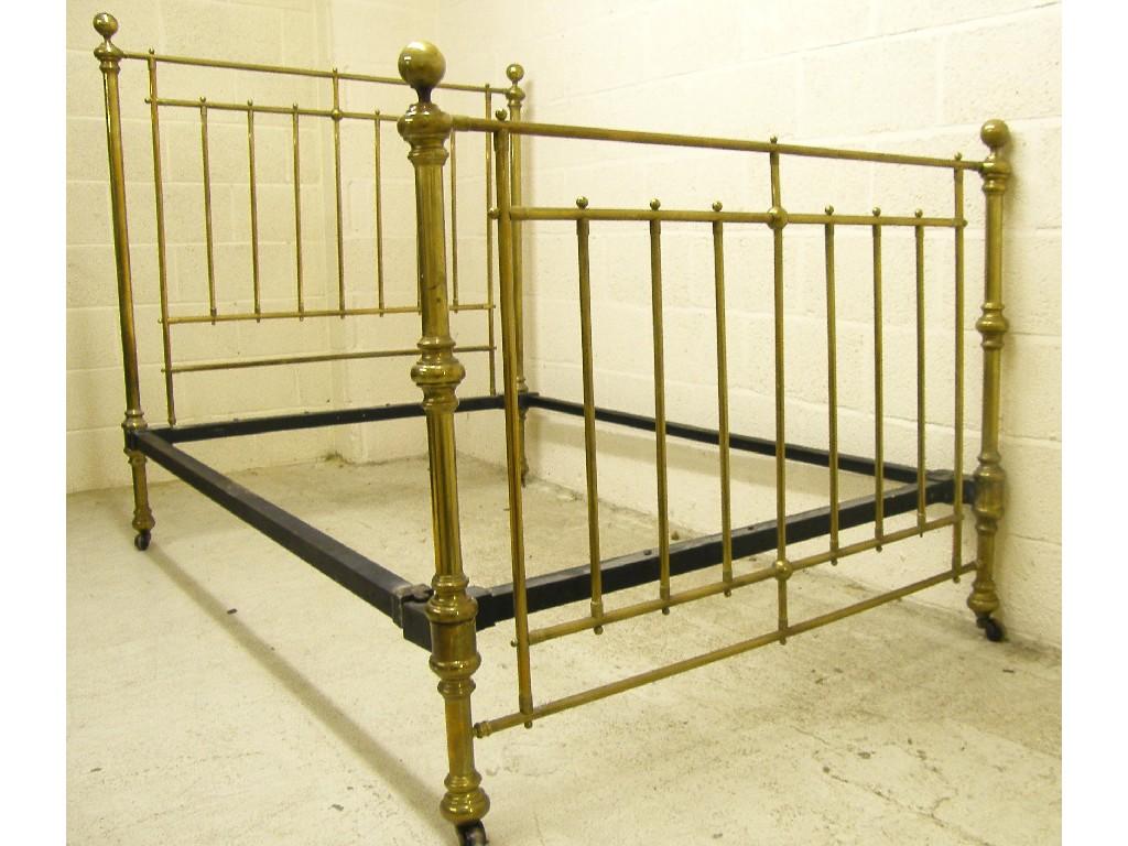 Appraisal: Polished brass double bed with side irons wide with base