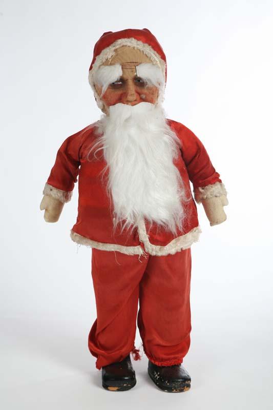 Appraisal: SANTA CLAUS FIGURE Cloth body with painted features and plaster