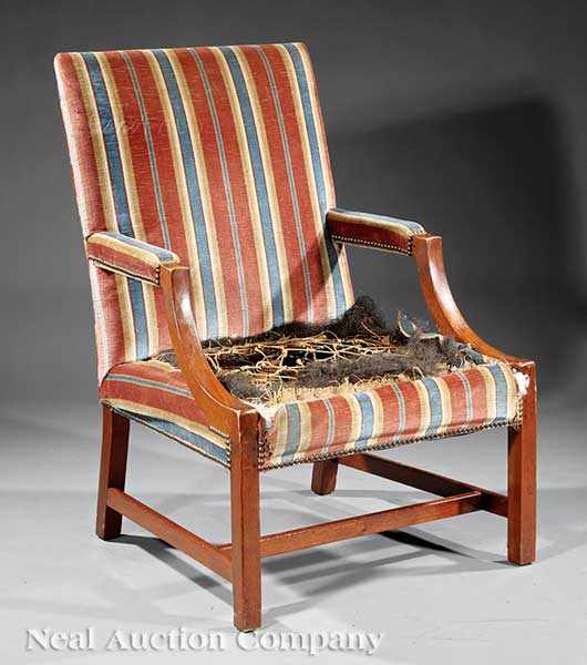 Appraisal: A George III-Style Mahogany Library Chair rectangular back padded curved