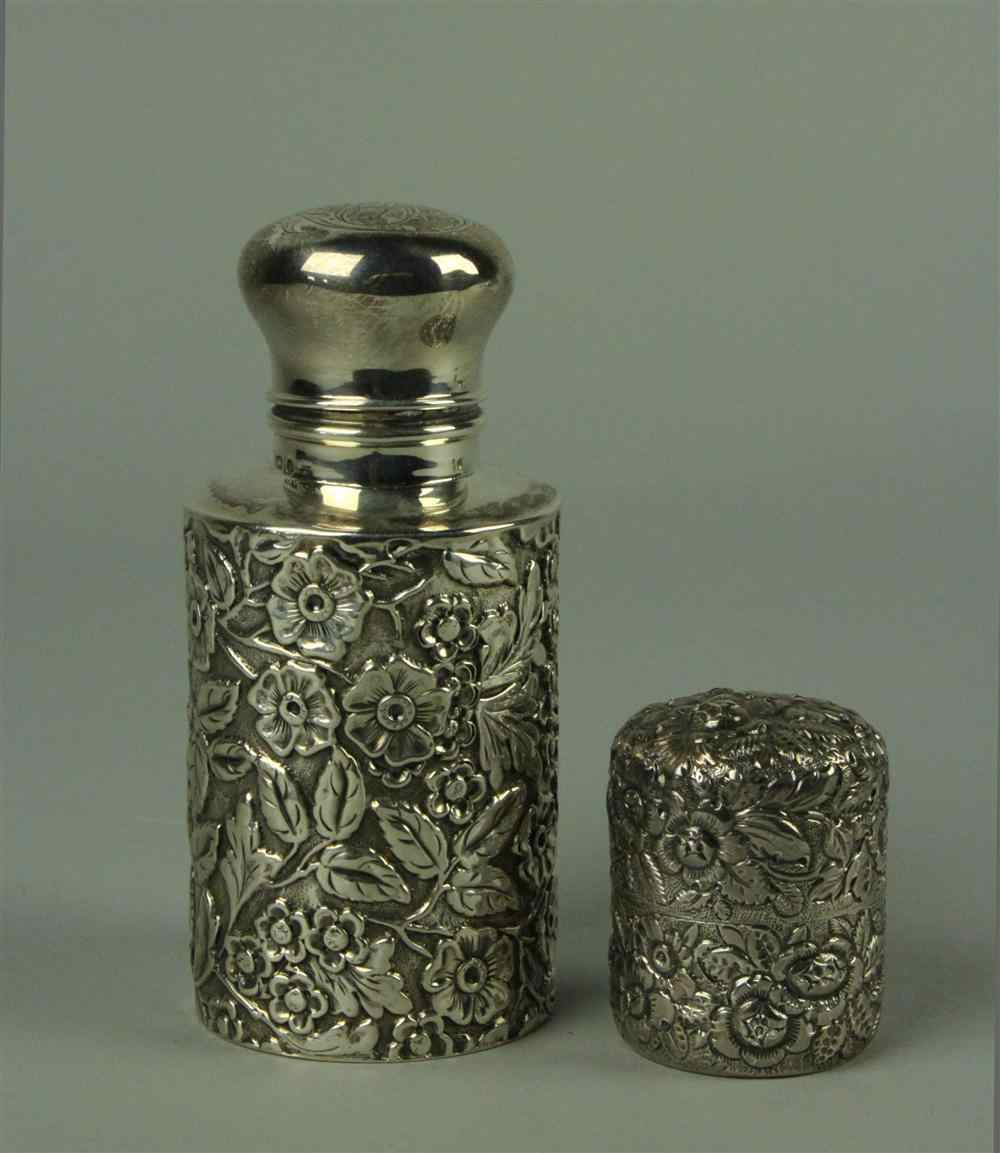 Appraisal: ENGLISH SILVER SCENT BOTTLE WITH REPOUSSE DECORATION late th century