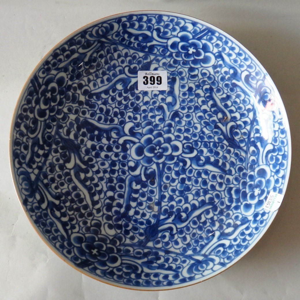 Appraisal: A Chinese blue and white dish Kangxi painted with flowering