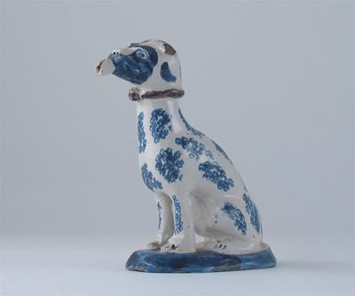 Appraisal: A Dutch Delft model of a blue and white seated