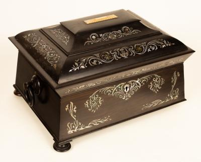 Appraisal: A th Century ebonised sewing box inlaid mother-of-pearl scrolls and