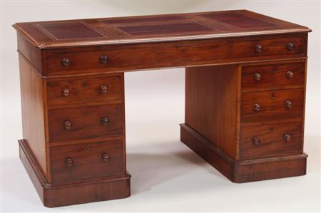 Appraisal: A late th century mahogany twin pedestal desk the moulded