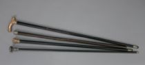 Appraisal: Lot of Four Victorian Walking Sticks Lot includes four metal