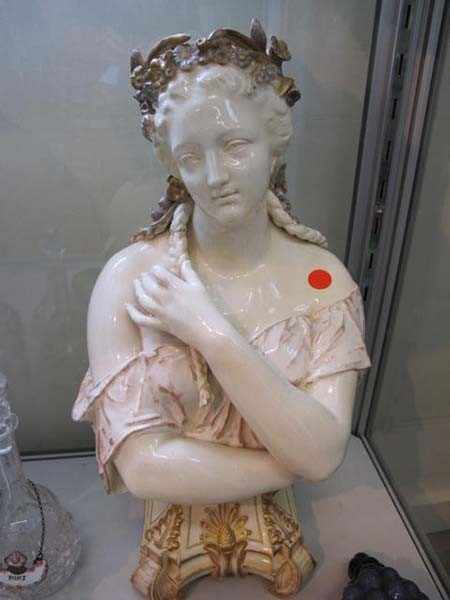 Appraisal: TH CENTURY CONTINENTAL CLASSICAL BUST OF A LADY WITH PLATS