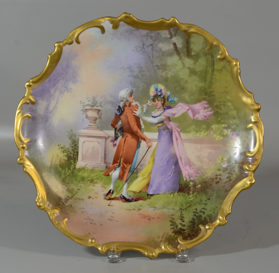 Appraisal: Large Limoges charger with ornate gilt border romantic couple in