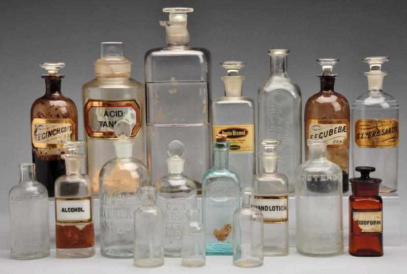 Appraisal: Lot of Medicine Bottles with Stoppers Description Seven drug bottles