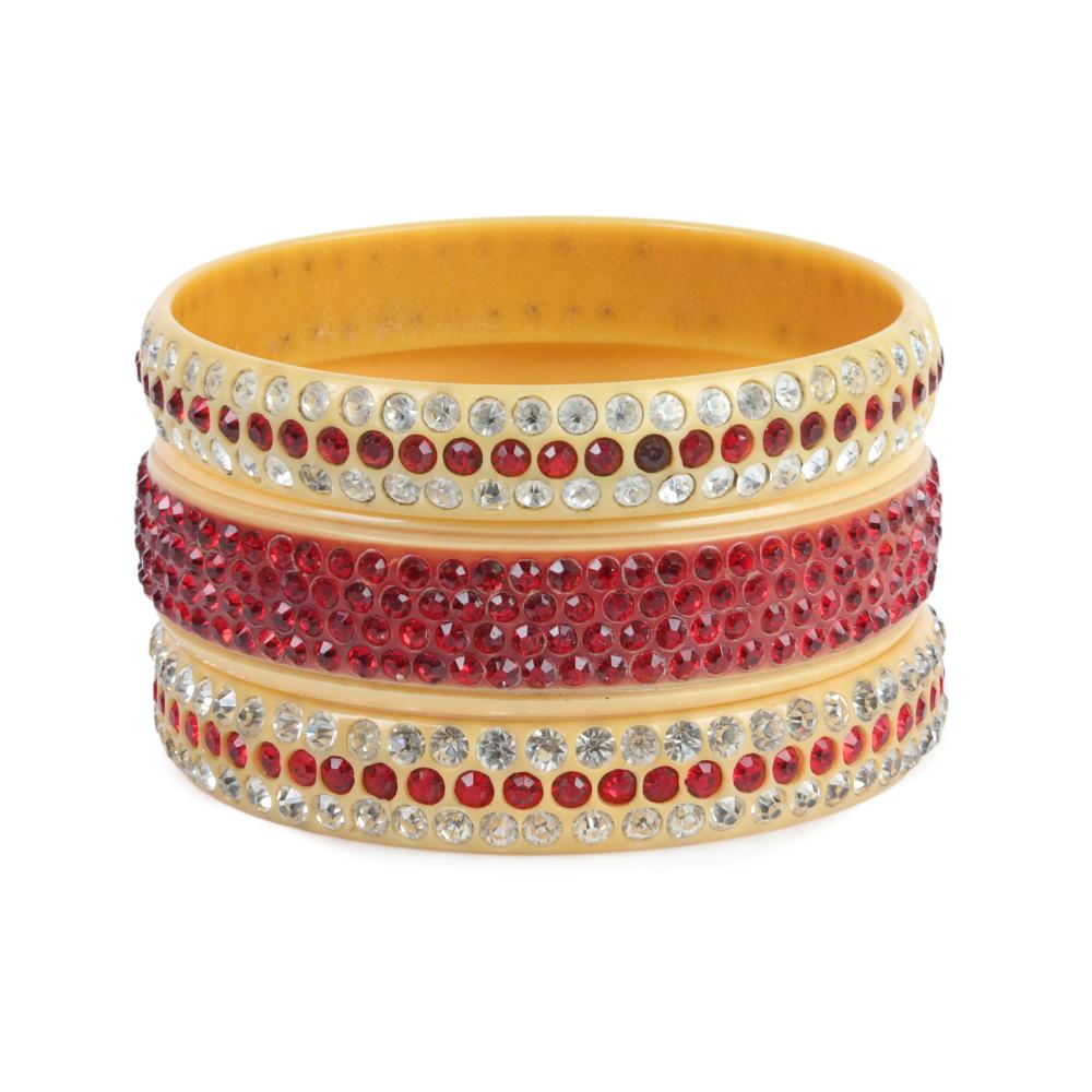 Appraisal: THREE RED ON CREAM CELLULOID SPARKLER BANGLE BRACELETS INNER DIAM