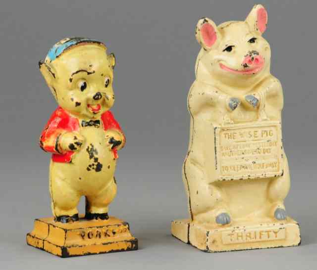 Appraisal: PORKY PIG AND WISE PIG STILL BANKS Hubley cast iron