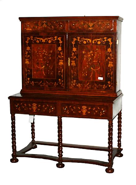 Appraisal: An Italian Rococo style marquetry inlaid secretary bookcase