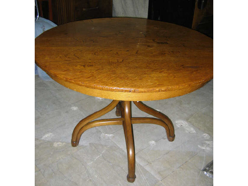 Appraisal: AUSTRIAN BENTWOOD TABLE having circular top raised on four column