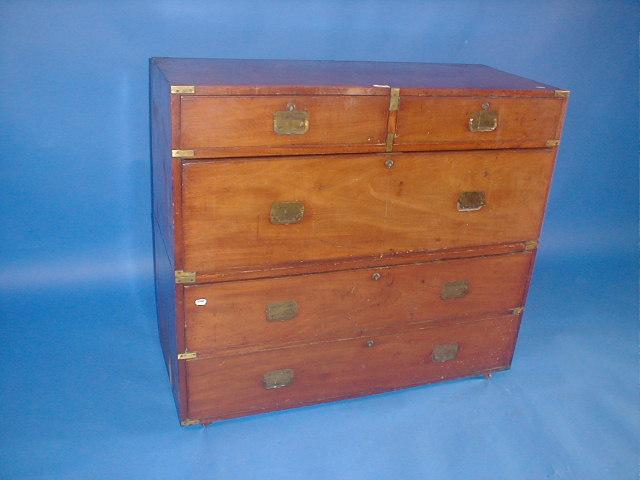 Appraisal: A mid thC teak campaign chest with oak lined drawers