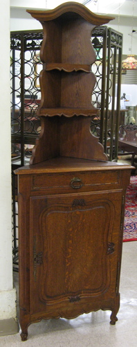 Appraisal: PROVINCIAL STYLE OAK CORNER CABINET French mid th century The