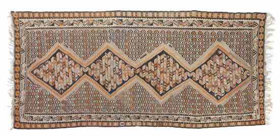 Appraisal: A Persian Kilim Wool Rug having repeating diamond medallions on