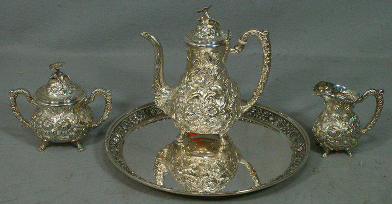 Appraisal: Stieff Floral Repousse sterling silver pc teaset c o teapot