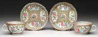 Appraisal: UNUSUAL PAIR OF CHINESE EXPORT CUPS AND SAUCERS The Mandarin