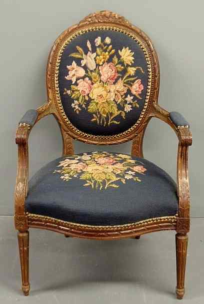 Appraisal: Louis XVI style fruitwood fauteuil with a needlepoint seat and