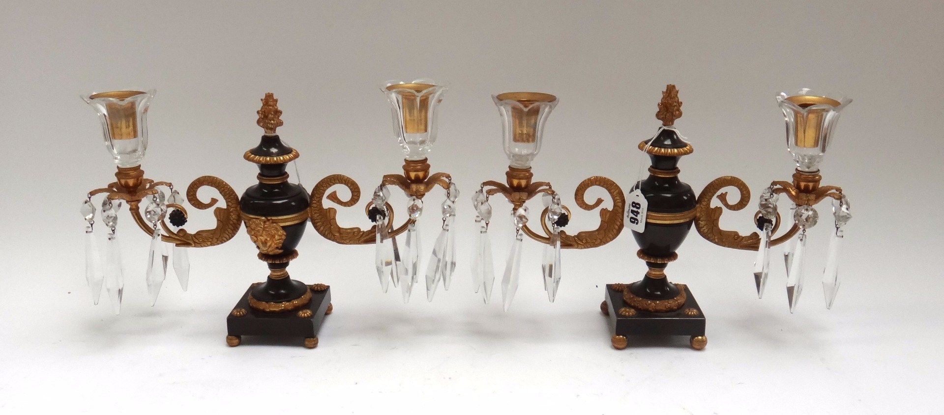 Appraisal: A pair of Regency gilt bronze and cut glass twin