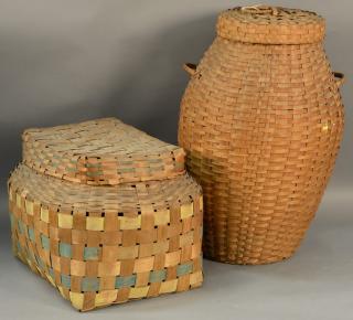 Appraisal: Two large splint Indian baskets each with covers one with