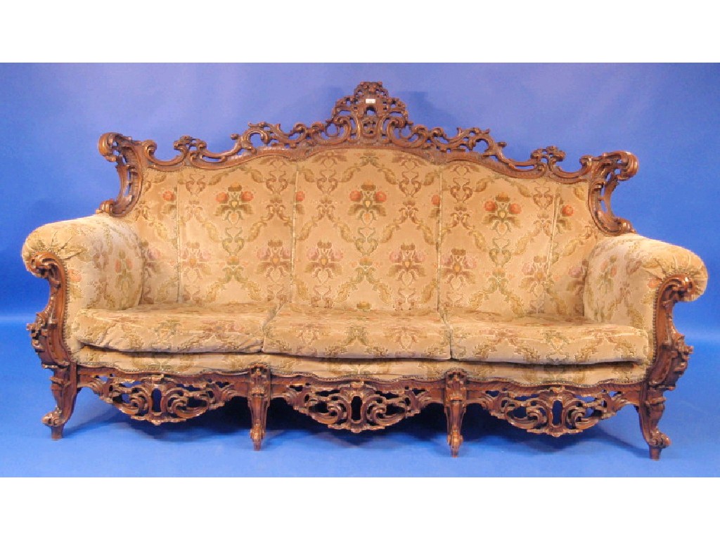 Appraisal: A Continental three seater sofa in Louis XV style and