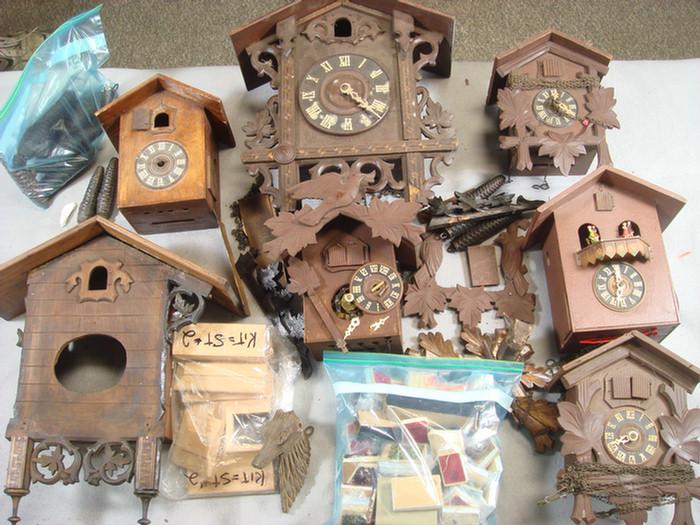 Appraisal: Group of cuckoo clock cases with bellows and weights Estimate