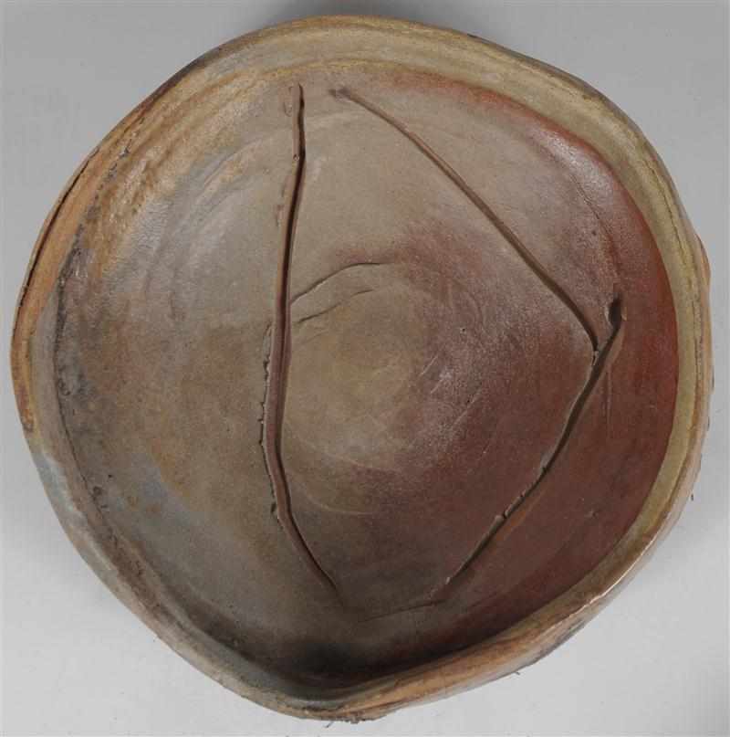 Appraisal: PETER VOULKOS - UNTITLED PLATE Wood-fired stoneware signed and dated