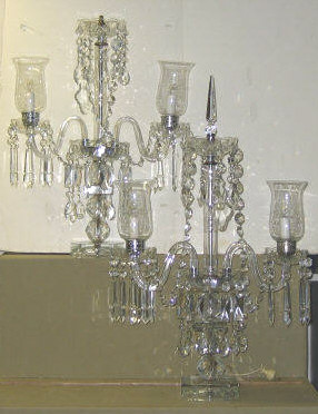 Appraisal: PAIR OF GLASS PRISMED GIRANDOLES Each knobbed stem supporting two