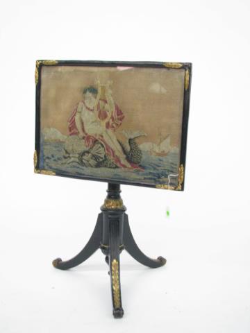 Appraisal: English th century needlepoint tilt top table with gold painted