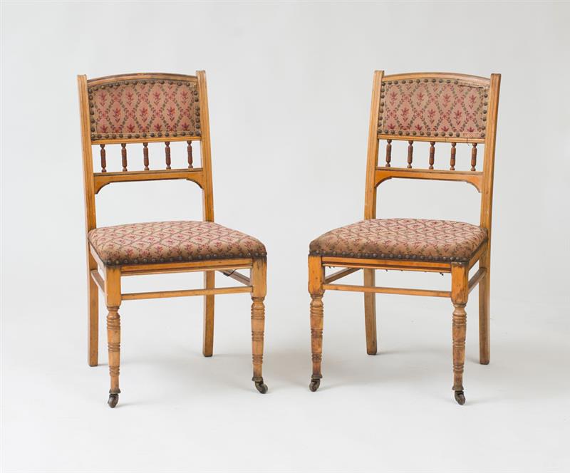 Appraisal: POTTIER STYMUS ATTRIBUTION PAIR OF BEDROOM CHAIRS Maple mahogany accents