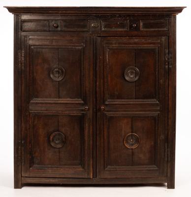 Appraisal: An th Century oak cupboard with carved roundels to the