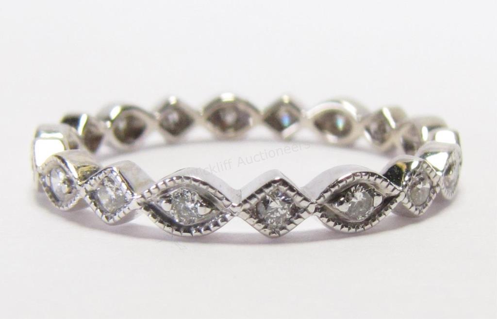 Appraisal: A K white gold diamond eternity stack band size dwt