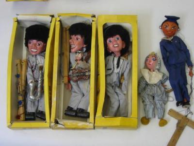 Appraisal: Pelham puppets Drummer Pop Singer Pop Singer yellow boxes and