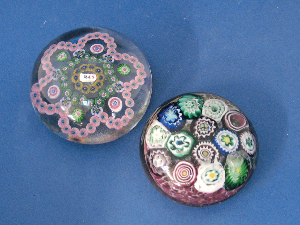 Appraisal: A PAPERWEIGHT with colourful canes in the form of a