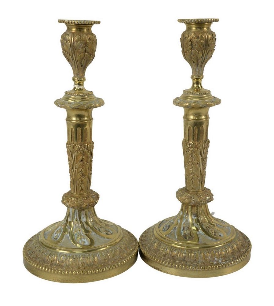 Appraisal: Pair of Louis XVI Style Gilt Candlesticks foliate cast stem