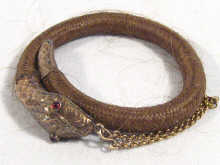 Appraisal: An antique gold mounted snake bracelet the body made of