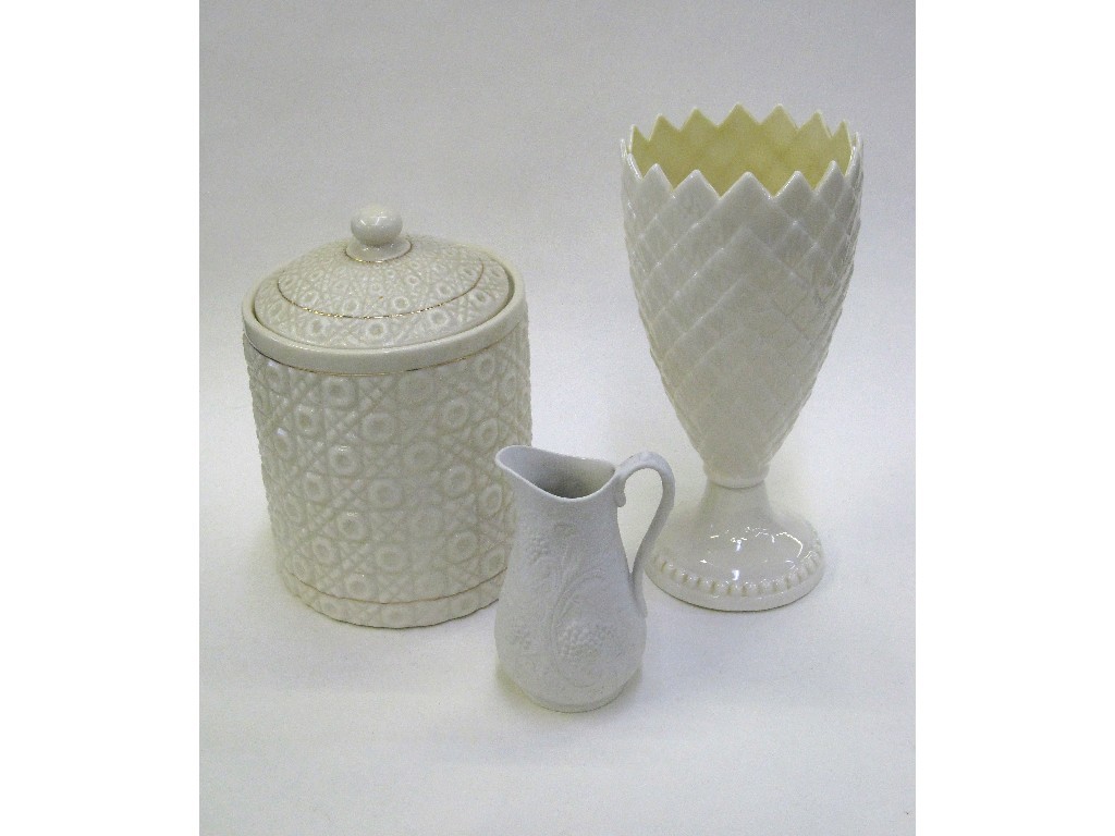 Appraisal: Belleek biscuit barrel and a pine cone vase plus a