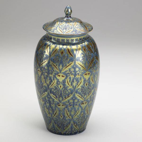 Appraisal: ZSOLNAYCovered jar in eosian Persian patternTwo areas of wear at