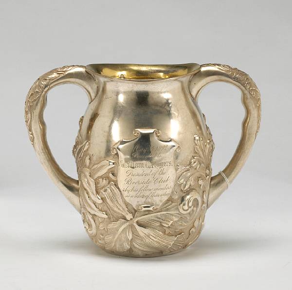 Appraisal: A sterling two handled cup with chased decorationGeorge W Shiebler