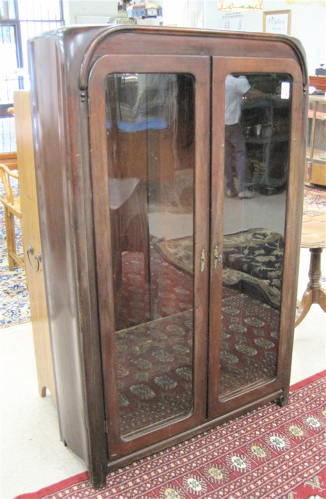 Appraisal: MAHOGANY CABINET BOOKCASE Edinburg Cabinet Co Edinburg Indiana early th