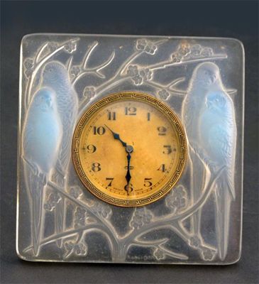 Appraisal: Inseparables' no a Lalique opalescent glass clock designed by Rene