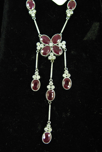 Appraisal: DIAMOND RUBY AND FOURTEEN KARAT WHITE GOLD NECKLACE WITH APPRAISAL