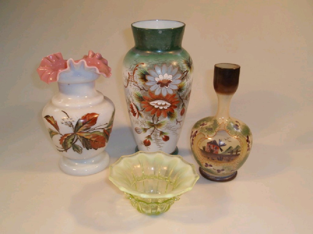 Appraisal: Three Victorian opaque glass vases with hand painted decoration and