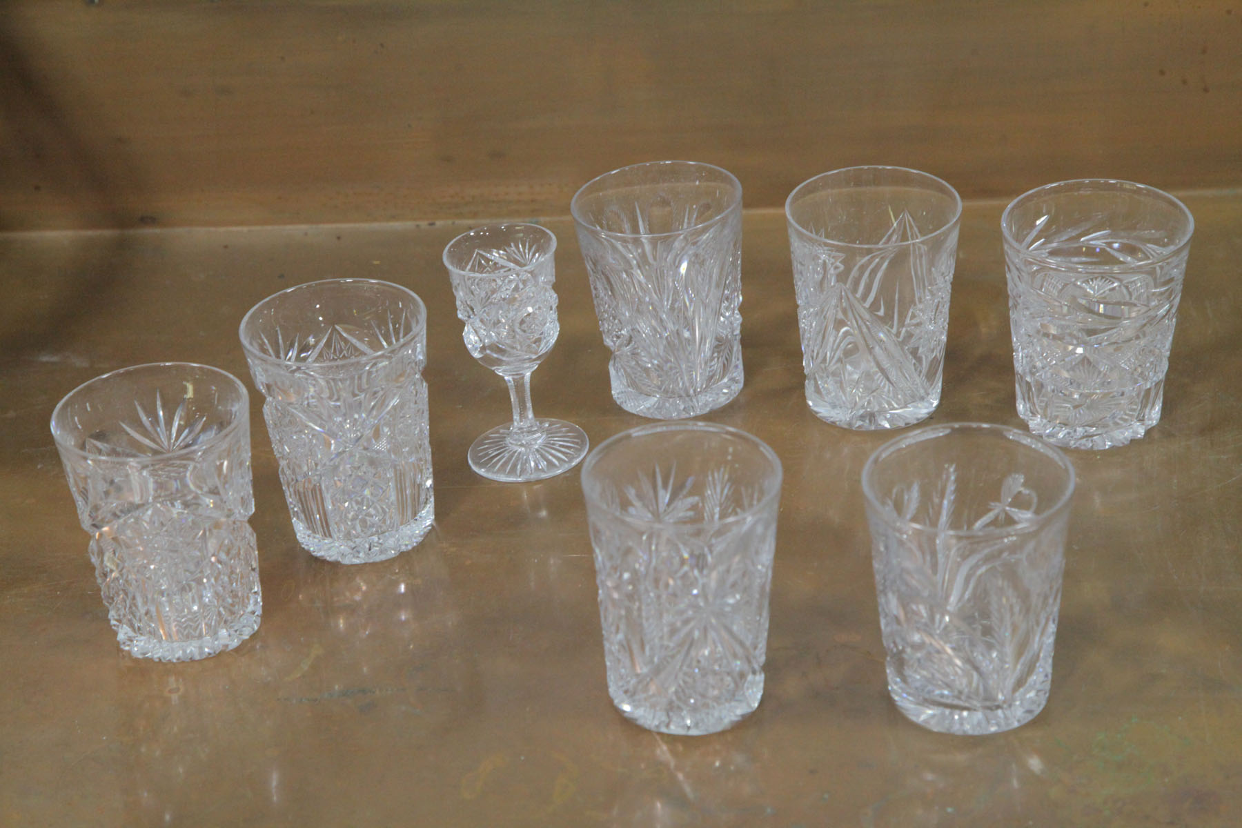 Appraisal: SEVEN LIBBEY CUT GLASS TUMBLERS AND A CORDIAL Massachusetts early