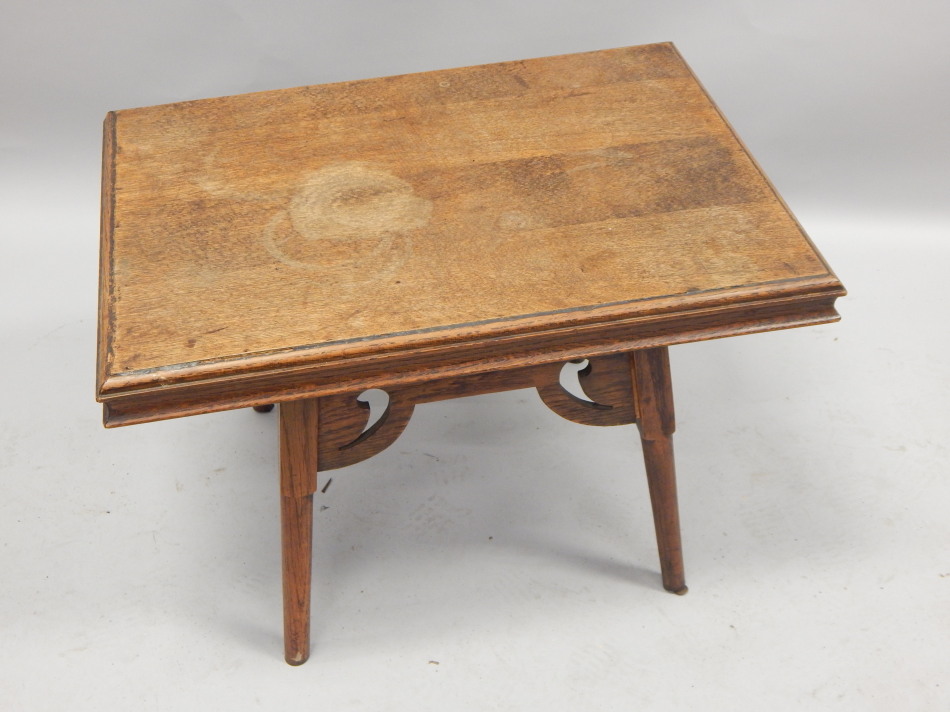 Appraisal: An unusual oak occasional table the rectangular top with a